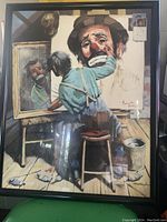 Full view of the framed clown self portrait print showing the clown artist painting his own image, signed by Emmett Kelly and Leighton-Jones.