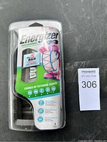 Front view showing Energizer Recharge branding and general appearance of the new battery charger in sealed plastic packaging.