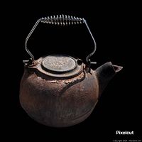 Front view of rusted cast iron kettle with wire handle and spout with hinged cover.