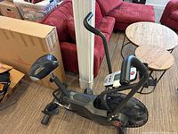 Overall view of the Schwinn AirDyne bike showing frame, seat, pedals, handlebars and flywheel fan