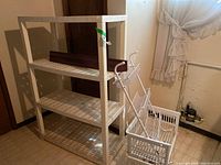 Full view of the 4-tier plastic shelf, over-the-door metal shelf, and two plastic baskets grouped together indoors.