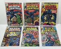 Full lot photo showing all six Black Panther comics arranged in two rows of three, bagged and boarded.