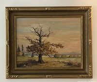 Framed oil painting showing entire artwork and frame in a hanging position.