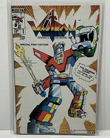 Full front cover of Voltron #1 comic showing Voltron robot with weapons. Special first edition.