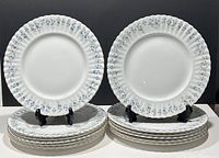 Two stacks of six vintage Royal Albert Memory Lane dinner plates with one plate displayed upright showing the full floral and gold rim design.