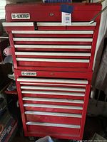 Two-piece red US General Pro metal tool chest with multiple drawers on casters