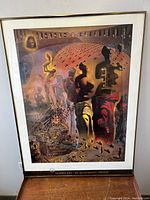 Frontal photo of the framed art print showing Salvador Dali's print with title on the bottom border.