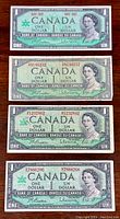 Four Canadian one dollar banknotes: one from 1954 series and three from 1967 Centennial series arranged flat on a wooden surface showing the front side featuring Queen Elizabeth II.