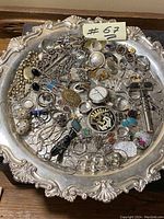 Top-down view of full tray with assorted jewelry