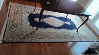 Full view of rug placed under dining table