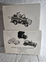 Box showing black and white images of the vintage style fire truck and the three-piece auto accessories set with label 'Heritage Village Auto Accessories' and Dept 56 logo.