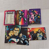 Front and back of several comic cards showing character portraits and action scenes from The Punisher comic series