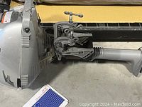 Side view of silver Honda BF2D outboard motor showing clamp mount and lower unit