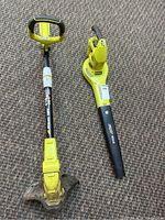 Both Ryobi cordless garden tools, leaf blower and weed eater, displayed side by side on carpeted floor showing overall condition and design.