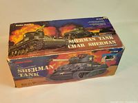 Box of the Radio Shack Sherman Tank model 60-3098 showing colorful artwork and product details.