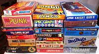 Full lot of 21 games stacked in three columns showing box art and titles