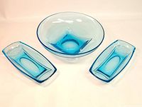 Three-piece glassware set including one round bowl and two rectangular dishes in Capri Colonial Blue color.
