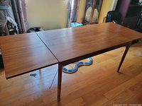 Full view of table open with extension leaf pulled out