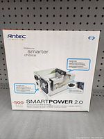 Front view of the Antec SP-500 SmartPower 2.0 500 watt power supply box showing product image and features.