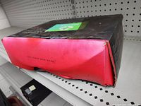 Black and red Asus box with 'For Those Who Dare' text, slightly damaged