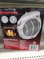 Box front showing image and specifications of Impress Electric Fan Heater model 96-701
