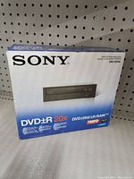 Front of Sony DVD Rewritable Drive DRU-720A box showing product image and key features