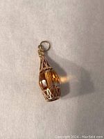 Charm front view on neutral background