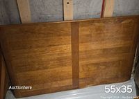 Main tabletop panel with dimensions approximately 55x35 inches, showing wood grain and wear on veneer.