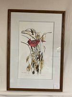 Full view of framed limited edition cardinal print with snow-dusted dried vines and leaves.
