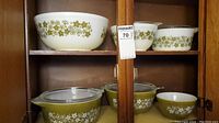 Three white Spring Blossom bowls on top shelf and three green Spring Blossom bowls on bottom shelf showing overall lot
