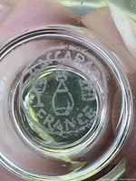 Image of the Baccarat France etching on the base of the glass confirming brand and origin