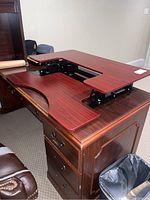 Overview of the Halter desktop extender positioned on a wooden desk, showing the surface, size, and shape.