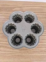 Top view of the Nordic Ware ice cream cone pan showing five cone-shaped molds in a flower pattern.