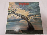 Front cover of the Deep Purple Stormbringer vinyl LP record showing artwork with clouds, a horse, and rainbow theme.