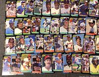 Top view of multiple Score brand baseball cards laid out, showing different players in batting, pitching, fielding poses, and portraits.