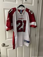 Front view of Arizona Cardinals football jersey with number 21 in white and red.