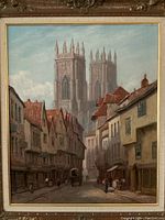 Central view of painting showing cathedral towers rising above street