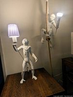 Both lamps together: standing lamp on table and hanging lamp on rope