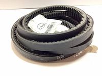 Coiled black molded notch V-belt showing clear Gates brand label and part number AX49.