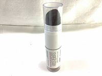 Photo showing front view of Maybelline Super Stay foundation stick with clear cap and visible blending sponge.