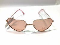 Front view of pink heart-shaped sunglasses showing tinted lenses and metal frame with Joe Fresh tag visible.