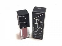 Nars Velvet Lip Glide lip gloss and product box showing front with branding and weight details.