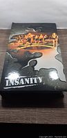 Closed black box with Insanity workout group cover image