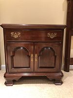 Single nightstand front view showing drawer and cabinet doors