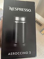 Photo of the Nespresso Aeroccino 3 milk frother box showing brand and model
