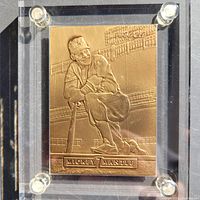 Front of bronze Mickey Mantle card showing player in relief and nameplate.