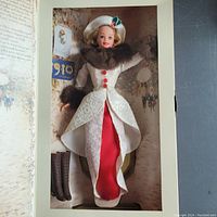 Full boxed 1995 Barbie doll from Hallmark Special Edition Holiday Memories series, showing doll in costume and background details