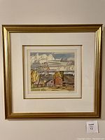 Framed print hanging on wall showing overall presentation