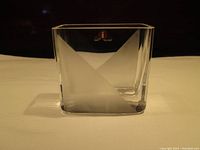 Front angled view of clear rectangular glass vase with frosted geometric kite pattern and partial Iittala label visible on the upper side.