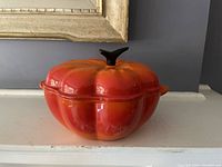 Front view of pumpkin-shaped cocotte with lid on